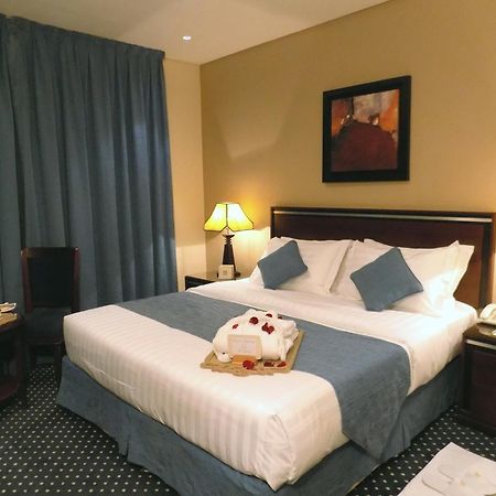 Onizah Hotel Unaizah Quarto foto